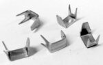 Top stops for spiral zippers with ca. 10 mm chain width